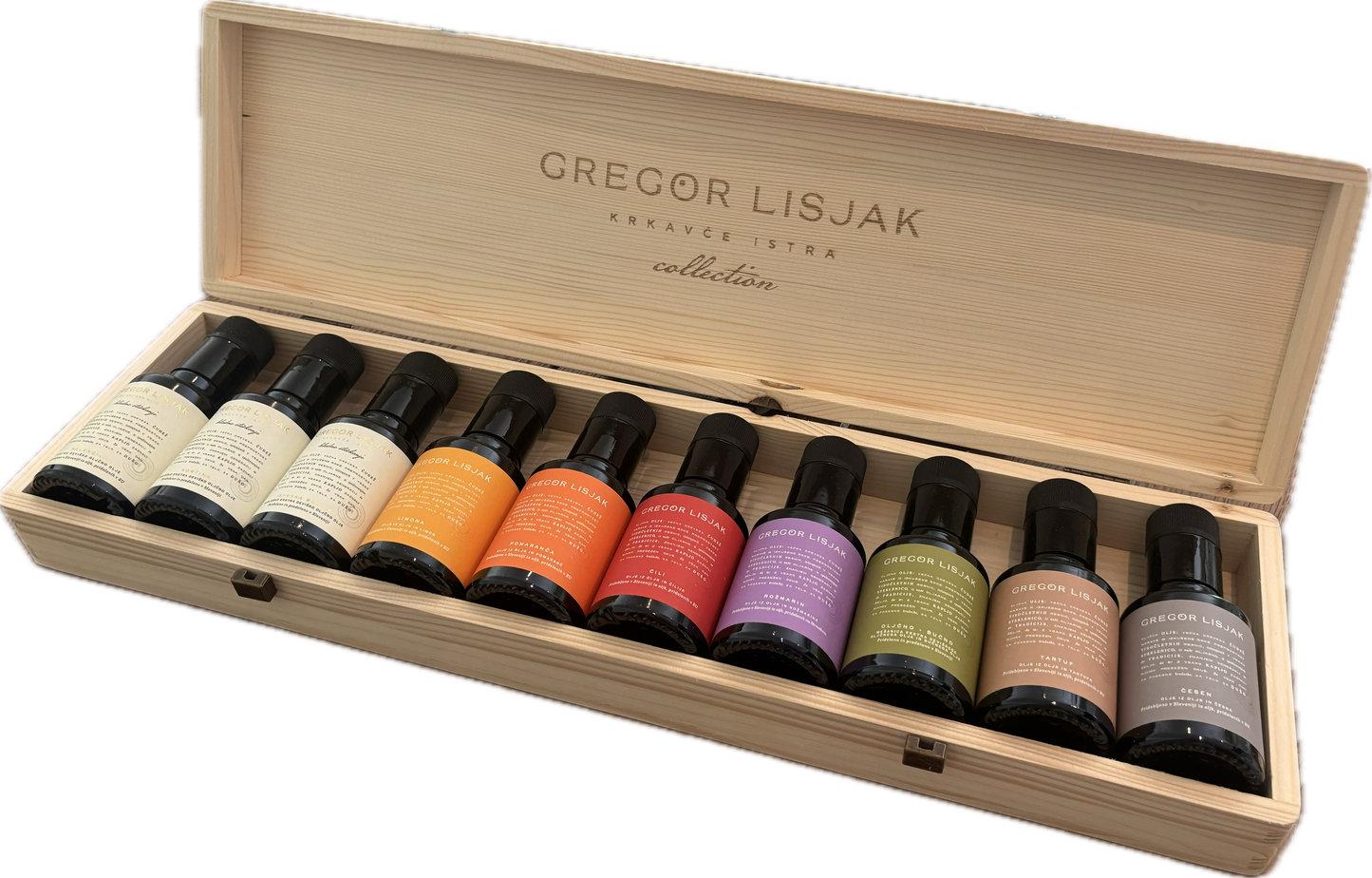 Set of Gregor Lisjak nail polish bottles in a wooden box on a white background